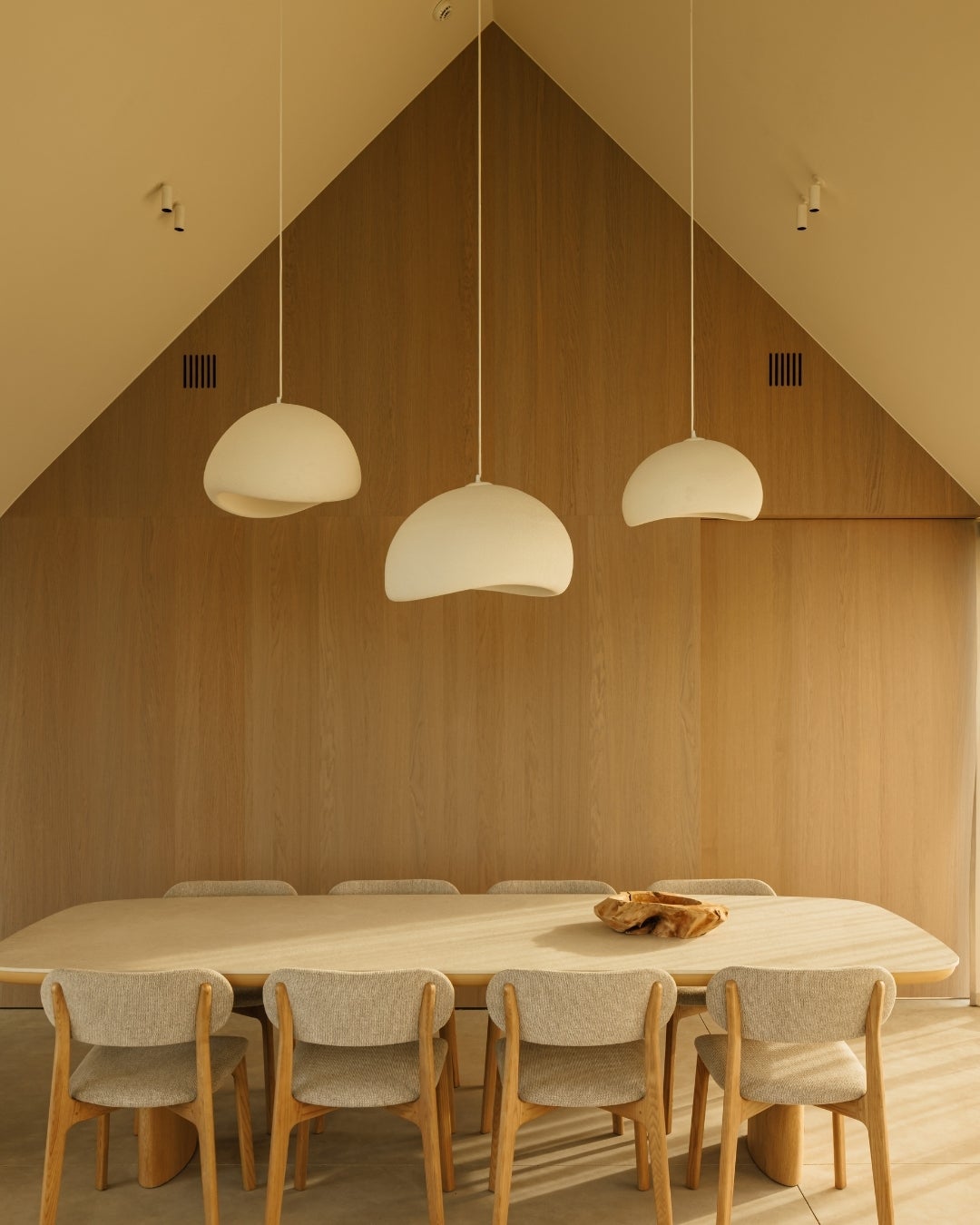 Interior with wood veneer wall panels and doors
